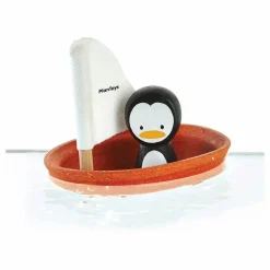 Bateau Pingouin flottant sur l'eau
