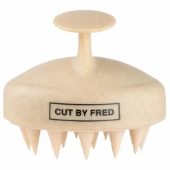 Brosse stimulante pour le cuir chevelu