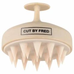 Brosse stimulante pour le cuir chevelu