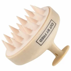 Brosse stimulante pour le cuir chevelu