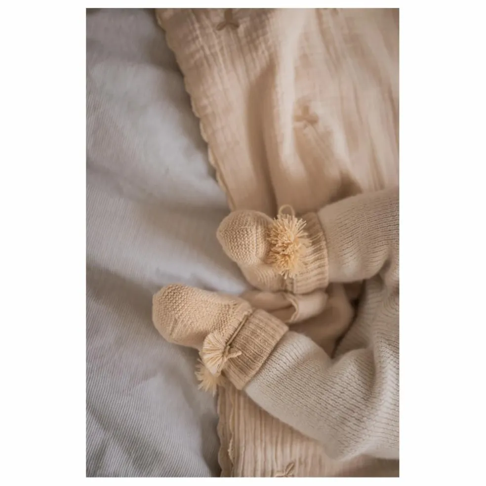 Chaussons en tricot et pochon brodé | Nude