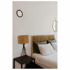 Tête de lit en bois brut et palme